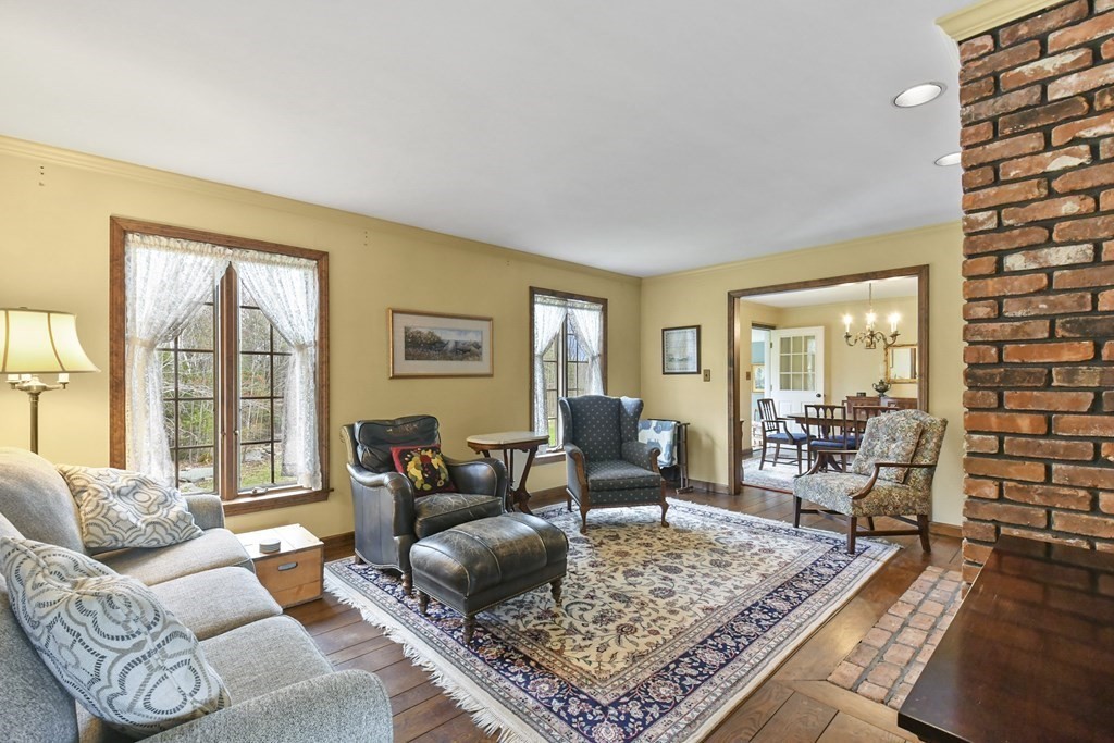 1007 Spring Hill Road Barre, MA 01005 - Photo 14 of 39 a living room with furniture and a rug