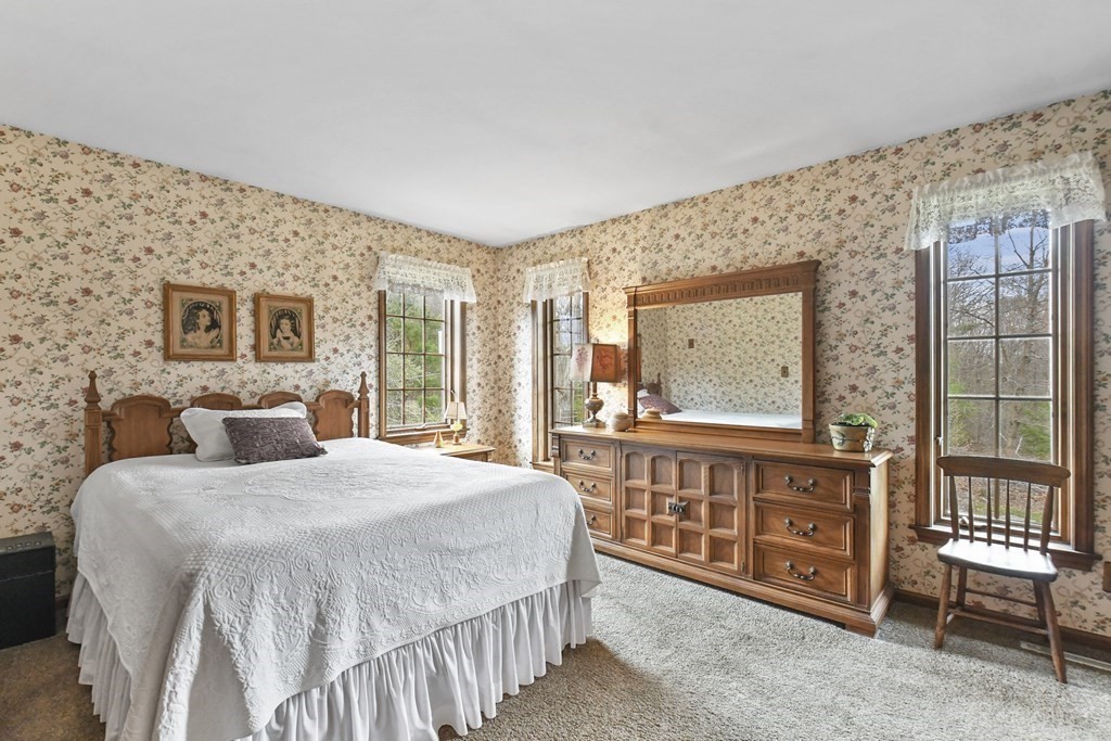 1007 Spring Hill Road Barre, MA 01005 - Photo 21 of 39 a bedroom with a bed window and a dresser