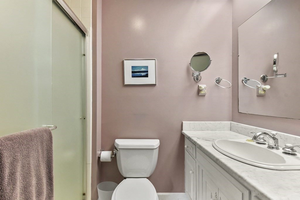 1007 Spring Hill Road Barre, MA 01005 - Photo 24 of 39 a bathroom with a toilet sink and mirror