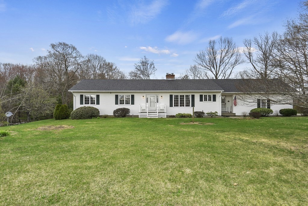 1007 Spring Hill Road Barre, MA 01005 - Photo 3 of 39 front view of a house with a big yard