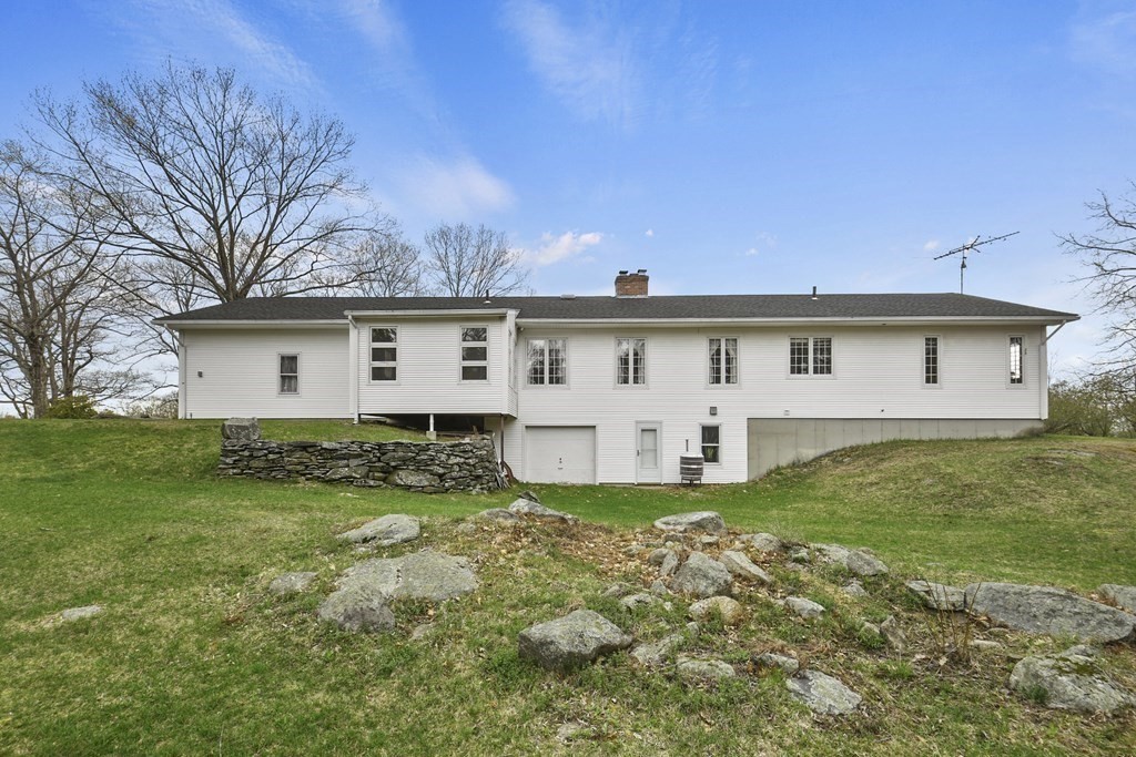 1007 Spring Hill Road Barre, MA 01005 - Photo 32 of 39 a view of a house with backyard and garden