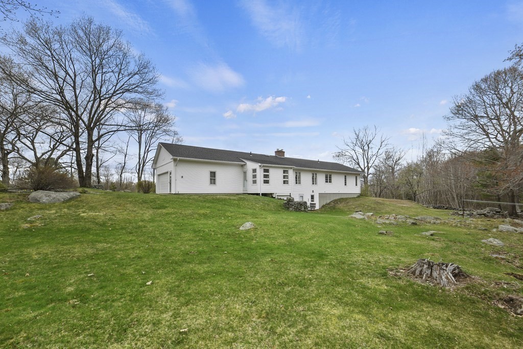 1007 Spring Hill Road Barre, MA 01005 - Photo 33 of 39 a view of a house with a big yard