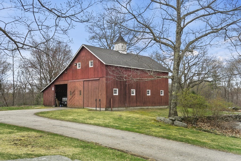 1007 Spring Hill Road Barre, MA 01005 - Photo 5 of 39 a front view of house with yard and green space