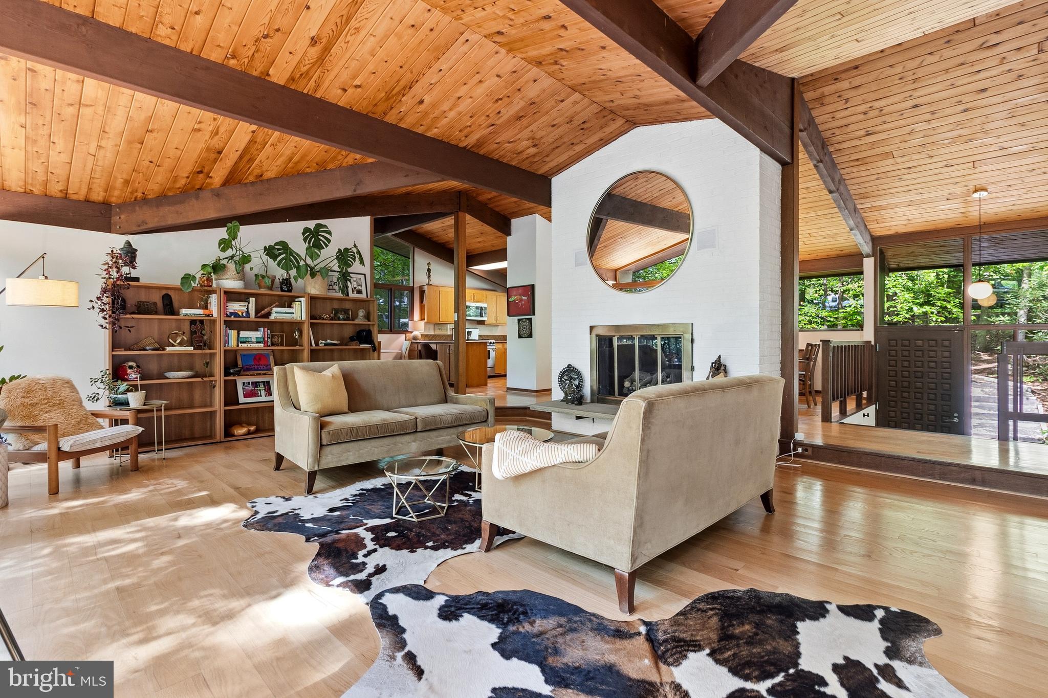 10815 Cross School Road Reston, VA 20191 - Photo 5 of 48 Living room with fireplace and view to kitchen
