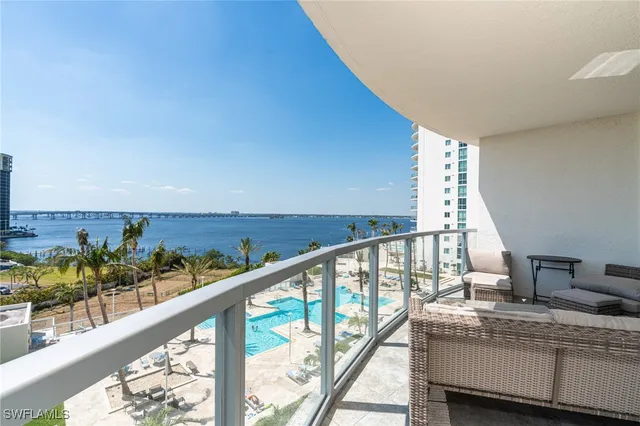 a view of balcony with furniture