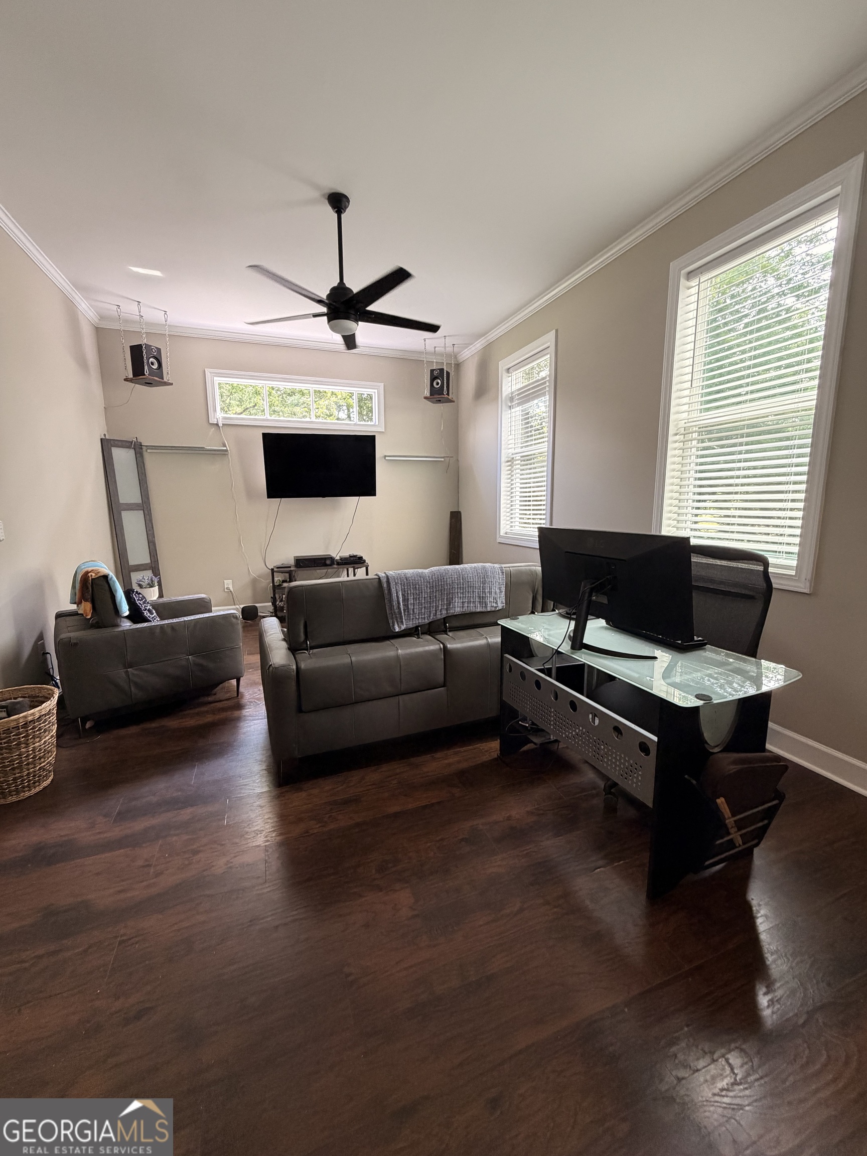 892 Perimeter Road Monticello, GA 31064 - Photo 7 of 38 a living room with furniture a flat screen tv and a window