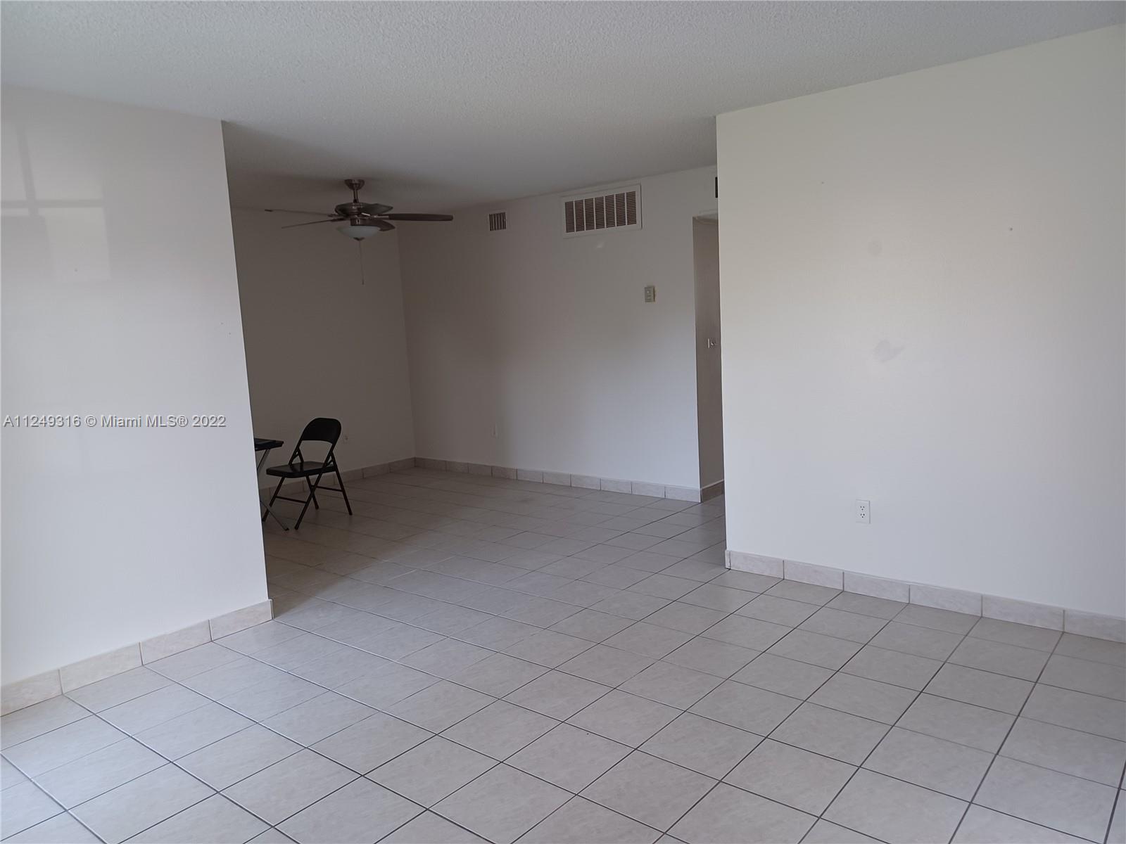 Andover Lakes Miami Gardens, FL 33179 - Photo 11 of 41 a view of an empty room
