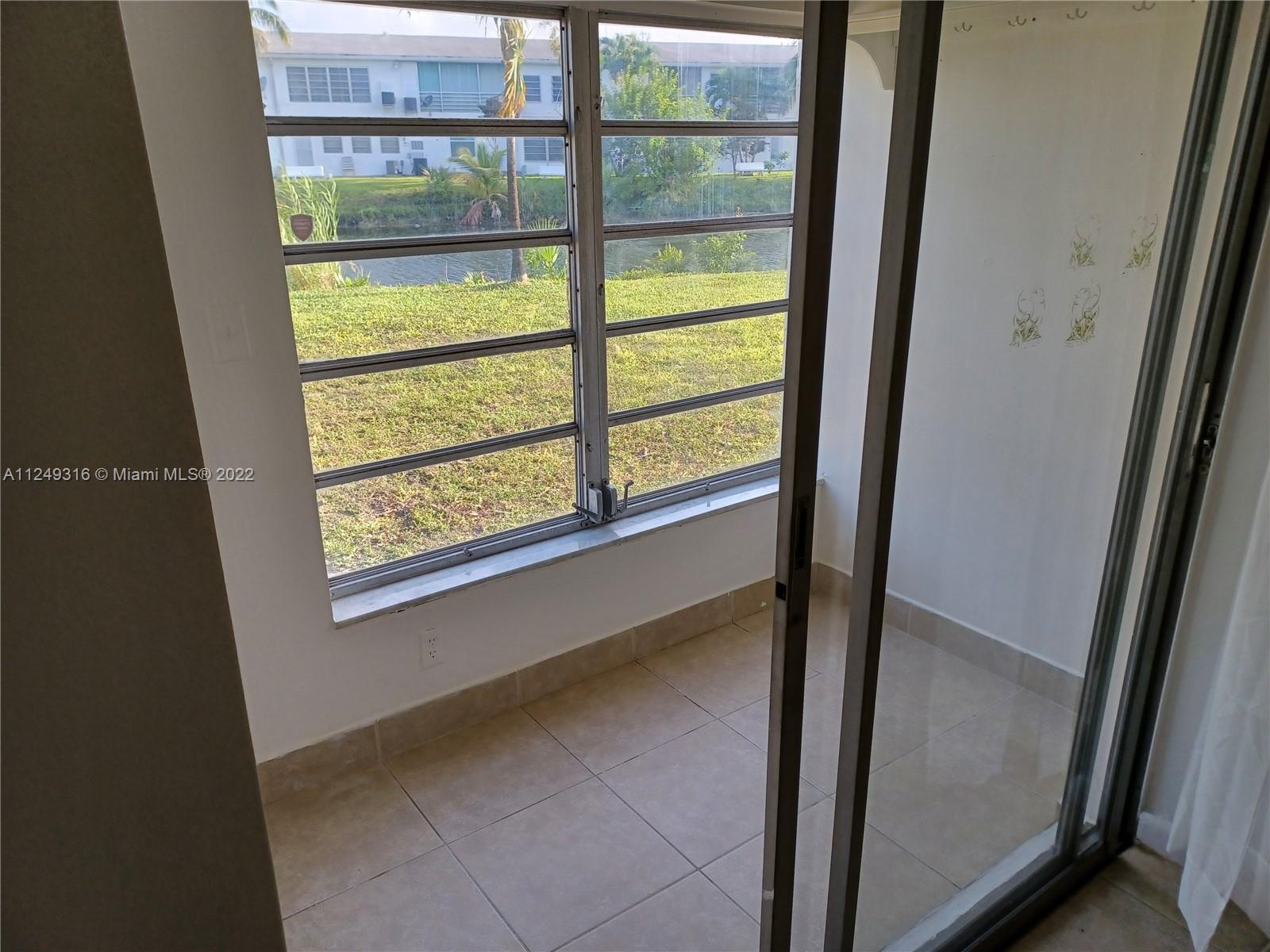 Andover Lakes Miami Gardens, FL 33179 - Photo 24 of 41 a view of front door