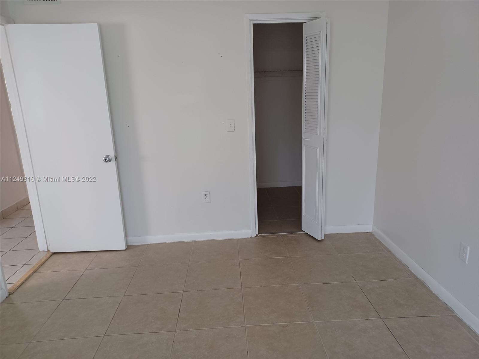 Andover Lakes Miami Gardens, FL 33179 - Photo 26 of 41 a view of an empty room