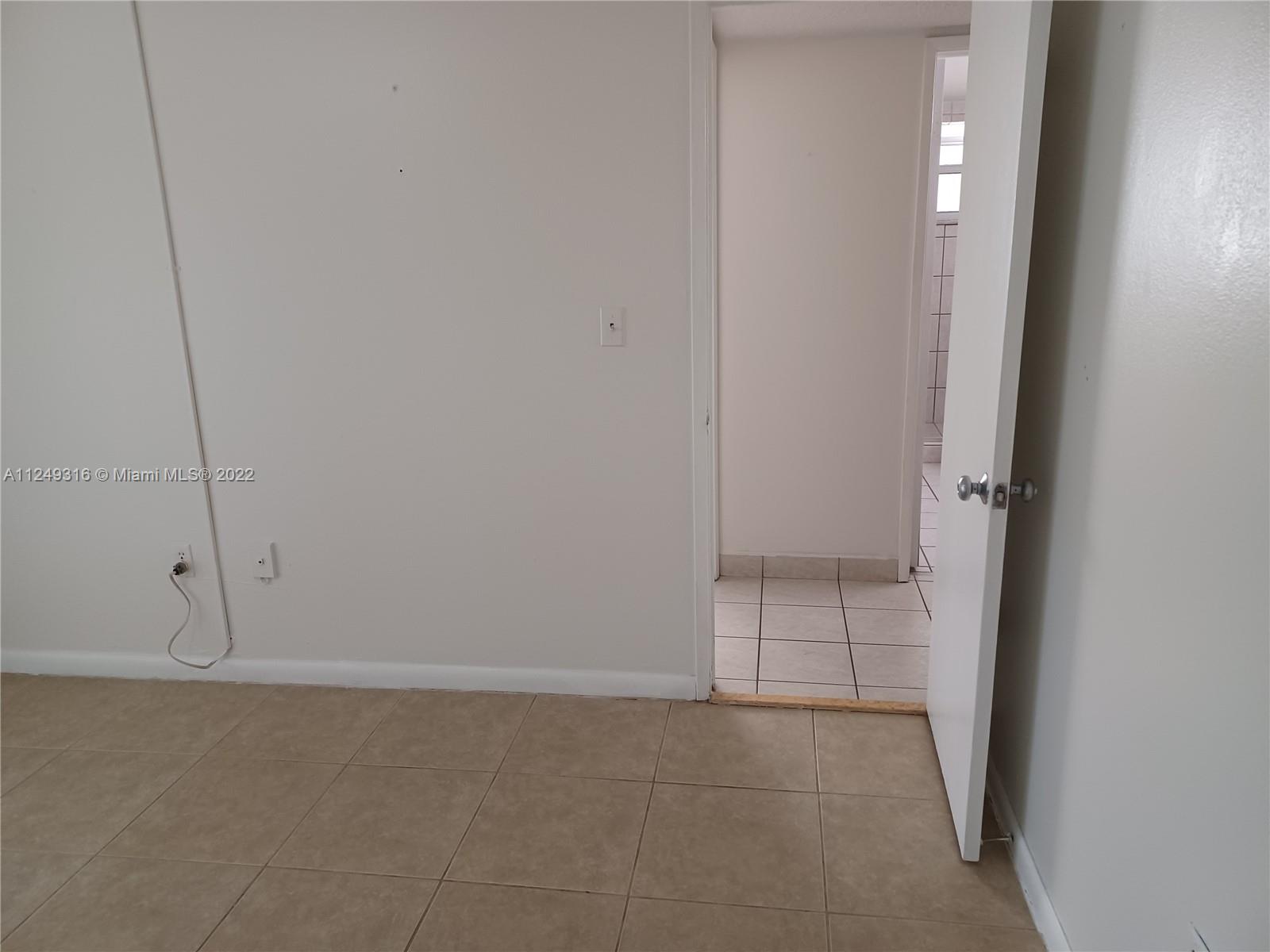 Andover Lakes Miami Gardens, FL 33179 - Photo 28 of 41 a view of an empty room