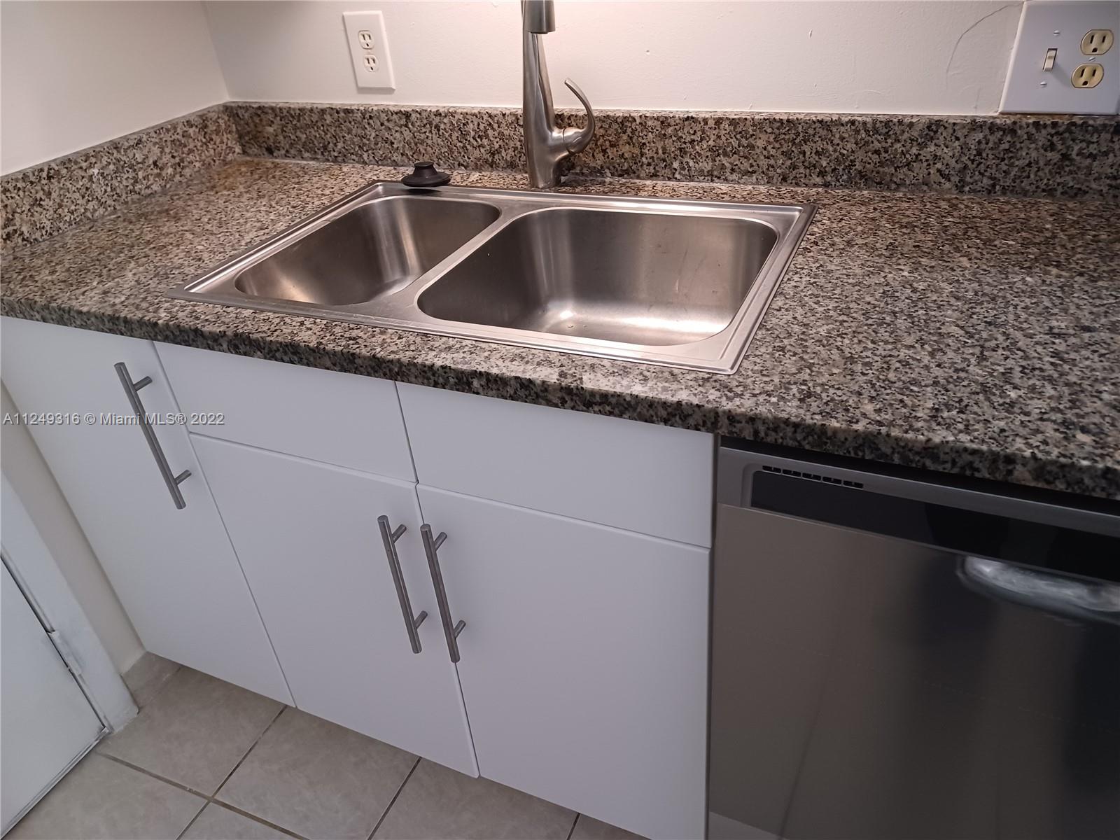 Andover Lakes Miami Gardens, FL 33179 - Photo 36 of 41 a close view of sink and tap