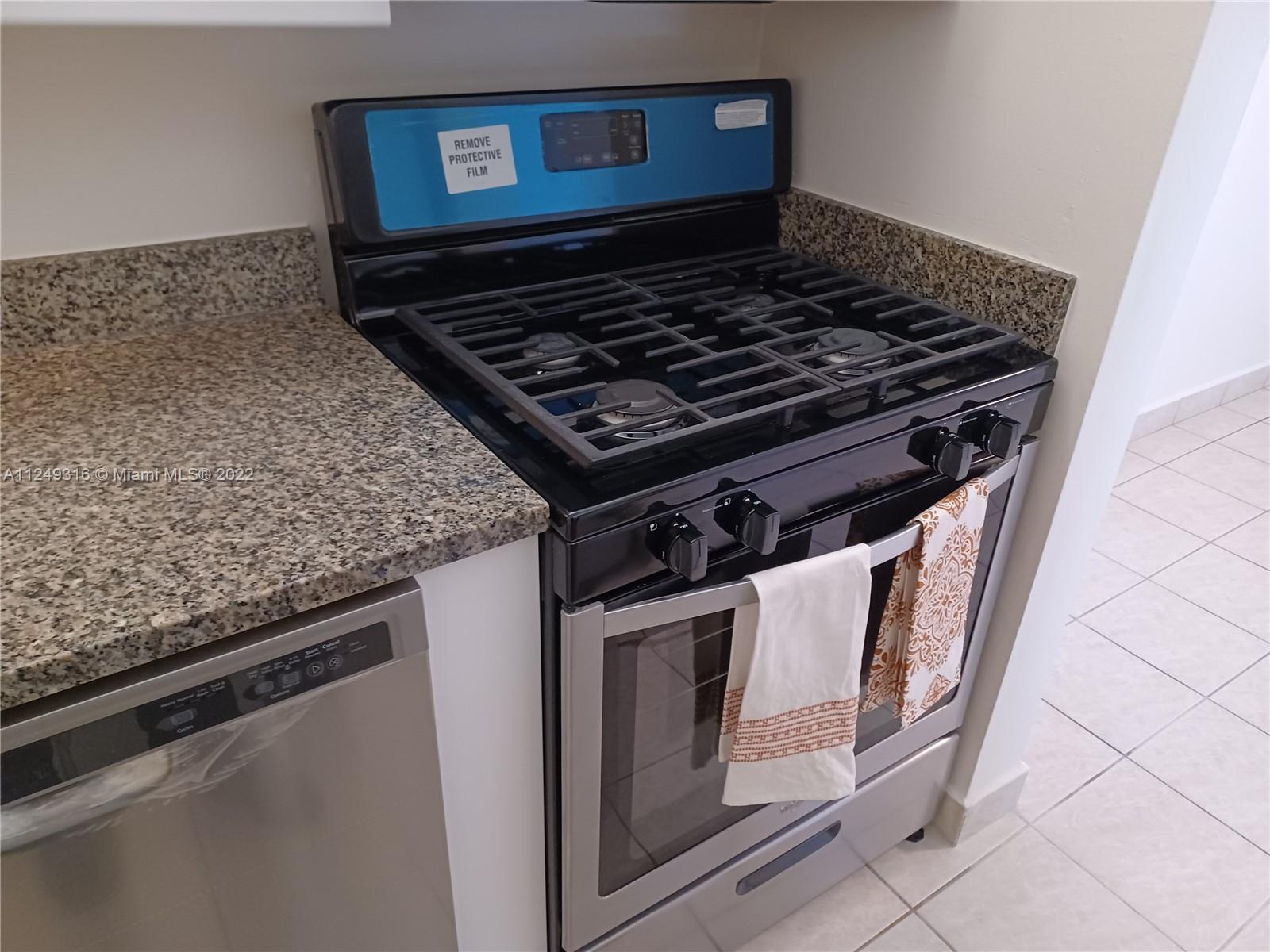 Andover Lakes Miami Gardens, FL 33179 - Photo 37 of 41 a close view of a stove