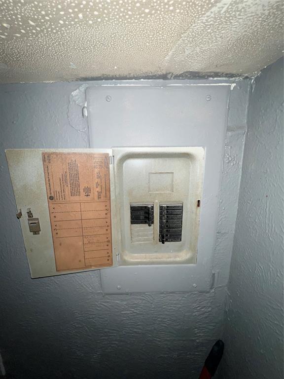 4224 Ramey Avenue Fort Worth, TX 76105 - Photo 14 of 19 Utility room featuring electric panel