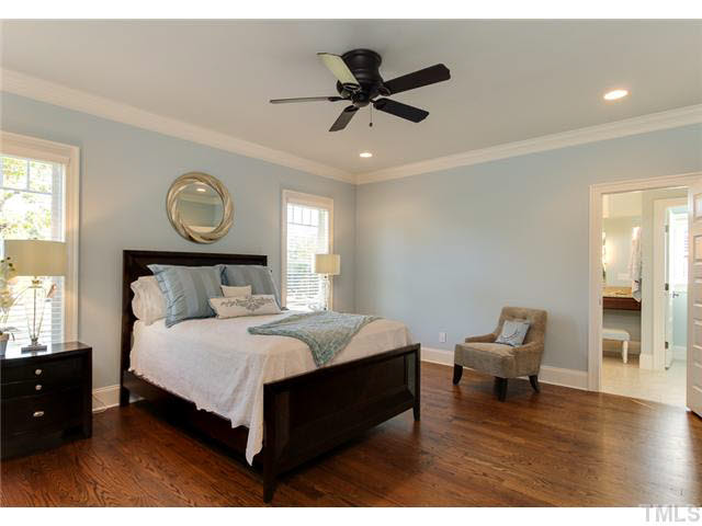 9238 Carlswood Court Raleigh, NC 27613 - Photo 13 of 24 This Parade Home Has Hardwood Floors In The Master Bedroom. Blinds And Ceiling Fan.