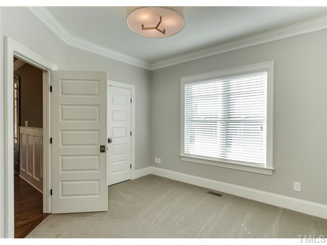 9238 Carlswood Court Raleigh, NC 27613 - Photo 18 of 24 Harwood In All Hallways, Stairs And Landings. Upgraded Doors And Carpeting.