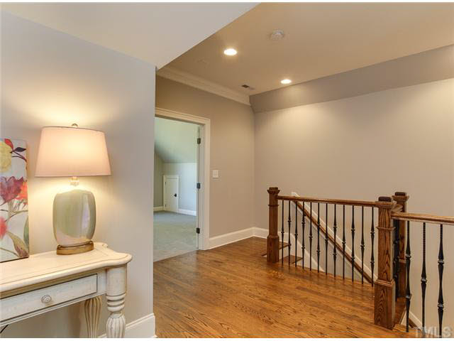 9238 Carlswood Court Raleigh, NC 27613 - Photo 19 of 24 Hardwoods In The Upstairs Landing And Staircase. The Loft Is A Perfect Place For An Open Office Or Homework Area.