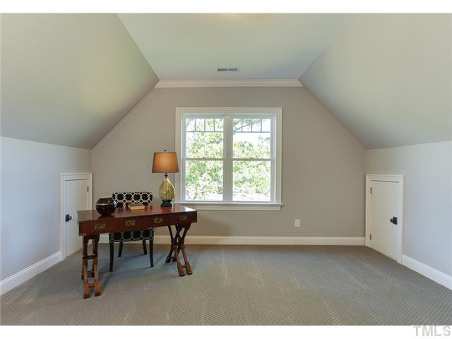 9238 Carlswood Court Raleigh, NC 27613 - Photo 20 of 24 Bonus Room With Dormer Storage. Wonderful Natural Light.