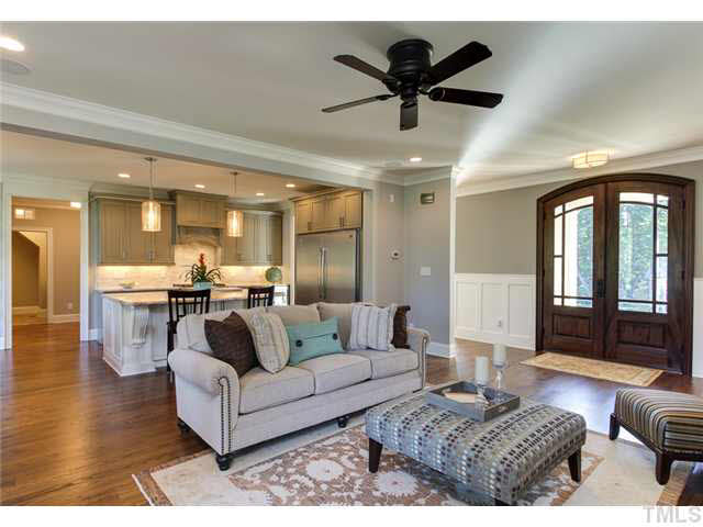 9238 Carlswood Court Raleigh, NC 27613 - Photo 6 of 24 Parade Of Homes Winner! Wonderful Entertaining Flow Open Kitchen And Family Room That Lead To Screen Porch with Fireplace. Beautiful Double Doors.