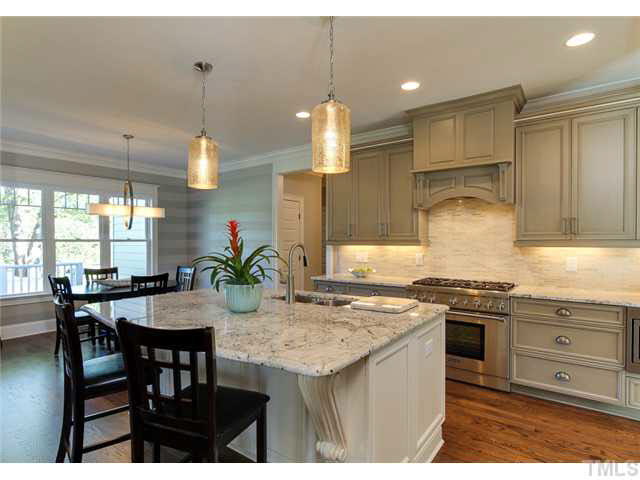 9238 Carlswood Court Raleigh, NC 27613 - Photo 7 of 24 Under Cabinet Lighting And Incredible Style In This Award Winning Kitchen. This Parade Home In Now Available For An End Of October Closing. Spacious Breakfast Room, Storage On All Sides Of The Island.