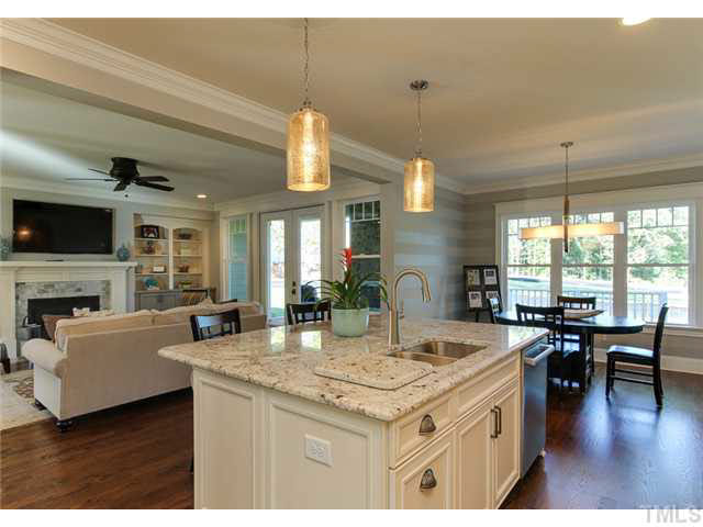 9238 Carlswood Court Raleigh, NC 27613 - Photo 8 of 24 Bright And Open Entertaining Flow. Stunning Granite And An Island That Has Storage On EVERY Side.
