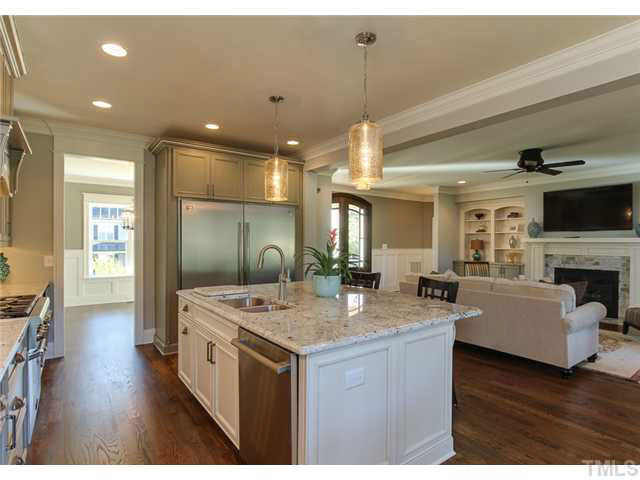 9238 Carlswood Court Raleigh, NC 27613 - Photo 9 of 24 Incredible Kitchen With Expansive Refrigerator and And Freezer. Thermador Applicances And Designer Lighting.
