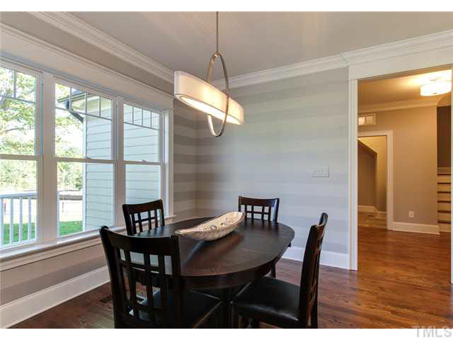 9238 Carlswood Court Raleigh, NC 27613 - Photo 10 of 24 Spacious Breakfast Room With Faux Painting For Style And Interest.