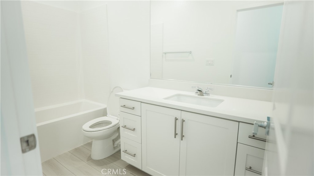 8457 Gabrielino Court Rancho Cucamonga, CA 91730 - Photo 12 of 58 a bathroom with a sink toilet and shower