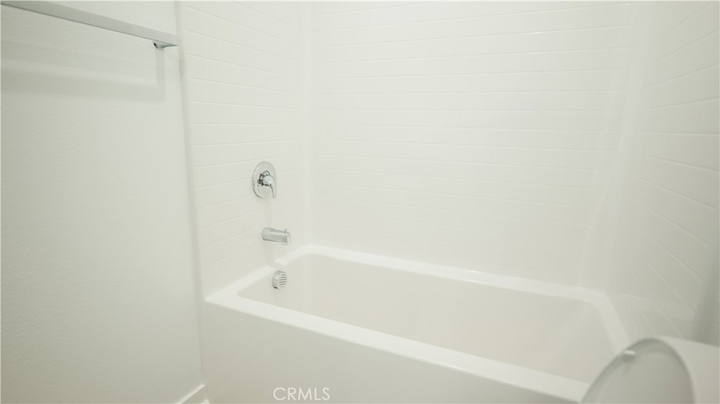 8457 Gabrielino Court Rancho Cucamonga, CA 91730 - Photo 15 of 58 a bathroom with a bathtub
