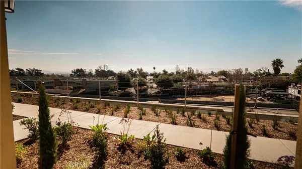 a view of a balcony with an outdoor space