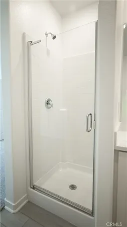 a view of staircase with white walls