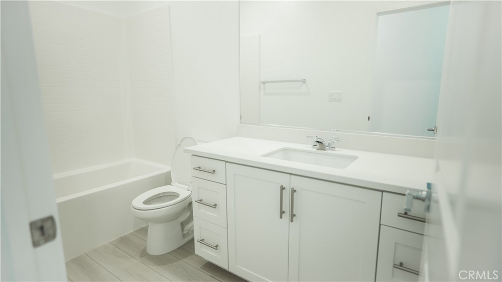 8457 Gabrielino Court Rancho Cucamonga, CA 91730 - Photo 39 of 58 a bathroom with a sink toilet and shower