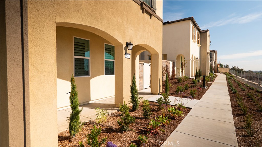 8457 Gabrielino Court Rancho Cucamonga, CA 91730 - Photo 4 of 58 a view of a balcony with potted plants