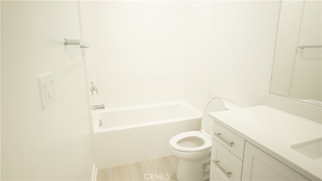 8457 Gabrielino Court Rancho Cucamonga, CA 91730 - Photo 43 of 58 a bathroom with a sink a toilet and shower