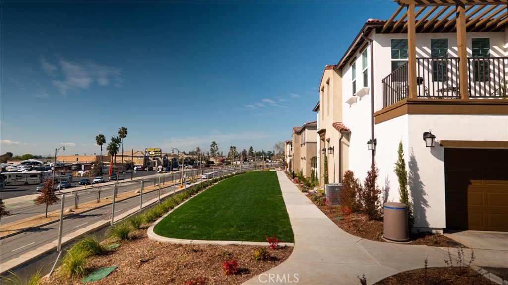 8457 Gabrielino Court Rancho Cucamonga, CA 91730 - Photo 46 of 58 a view of a swimming pool with outdoor seating and a pathway