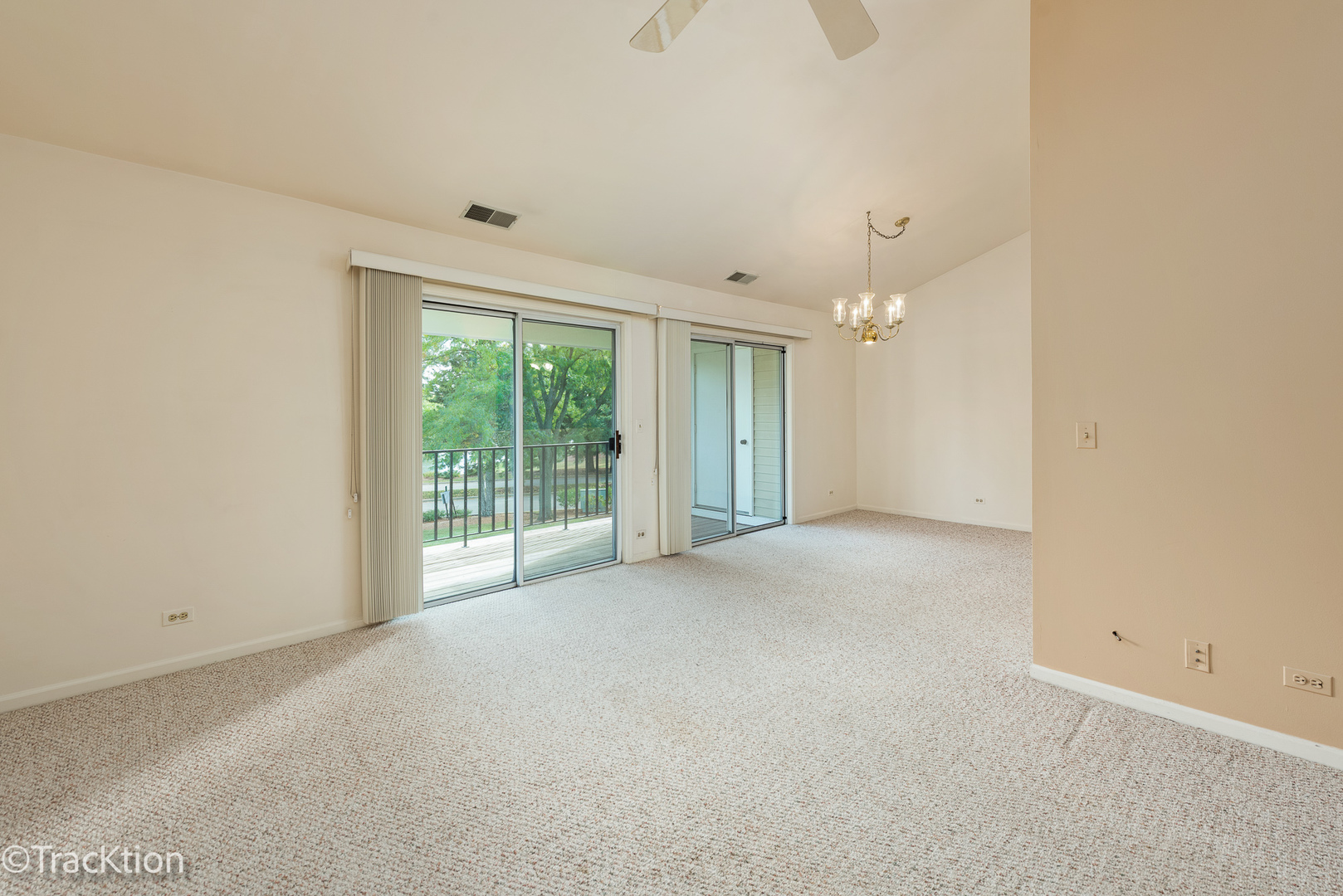 802 Butternut Lane, Unit D Mount Prospect, IL 60056 - Photo 4 of 18 a view of an empty room with a window