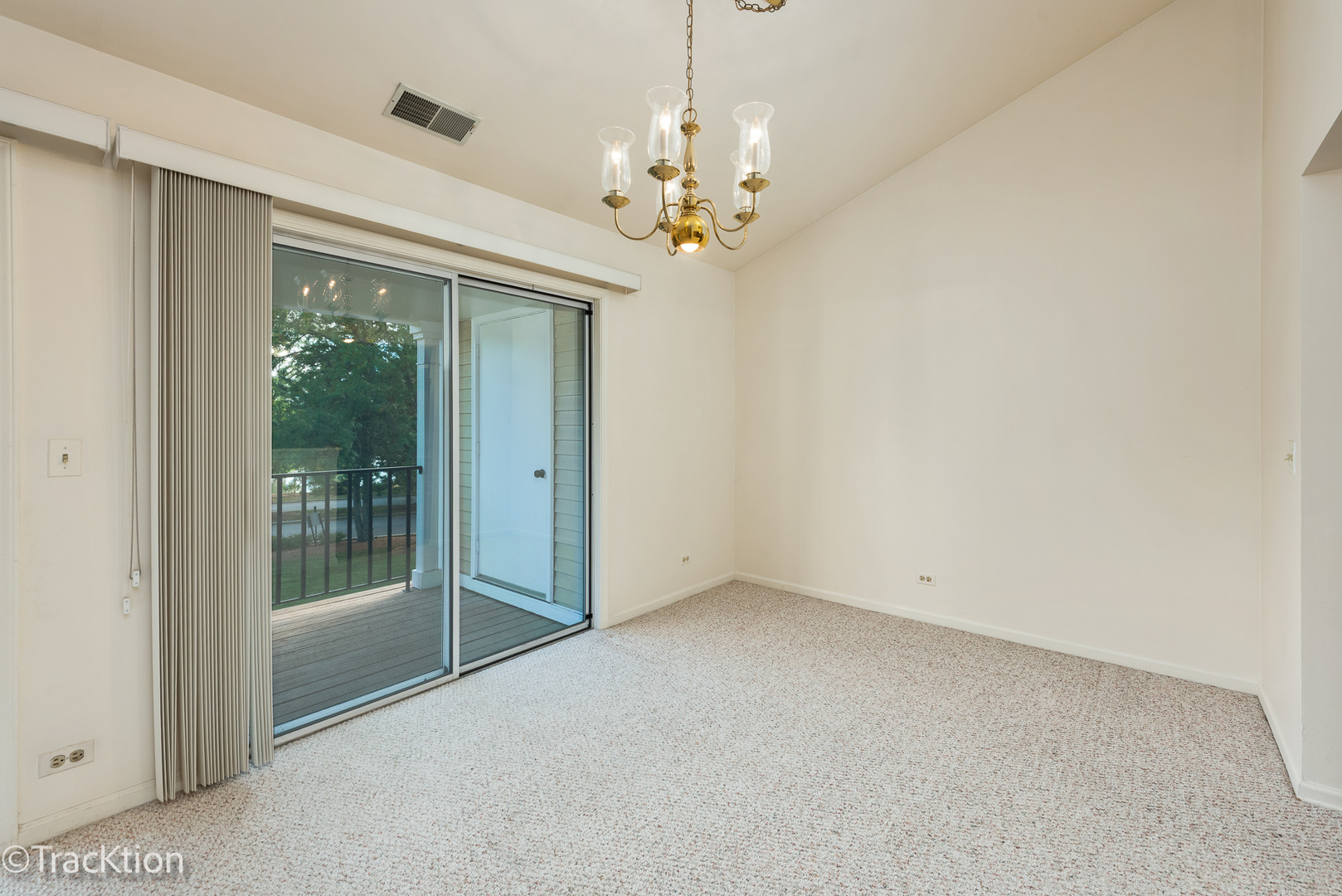 802 Butternut Lane, Unit D Mount Prospect, IL 60056 - Photo 7 of 18 a view of an empty room with a window