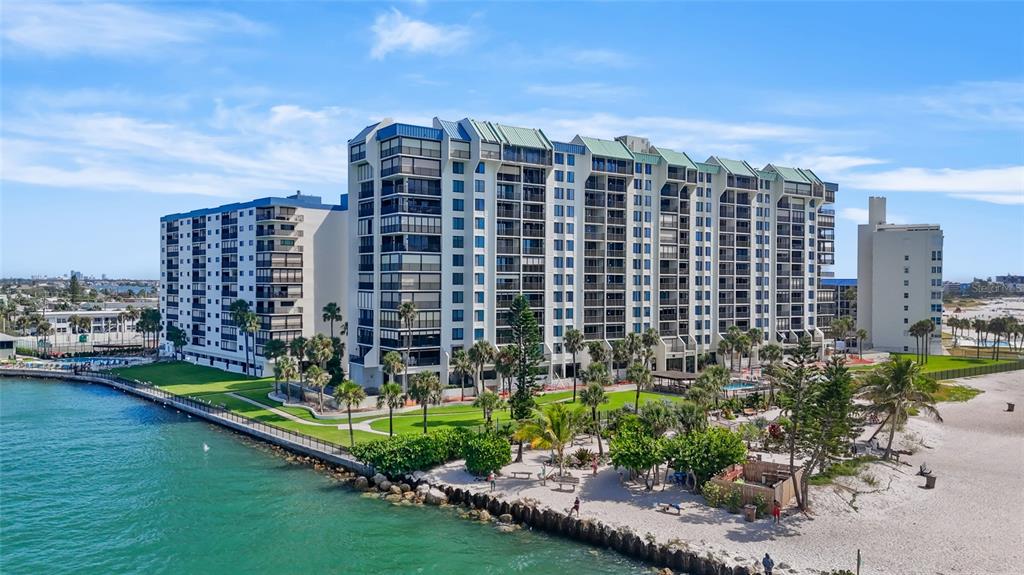 7150 Sunset Way, Unit 903E St. Pete Beach, FL 33706 - Photo 24 of 26 a view of a city with tall buildings