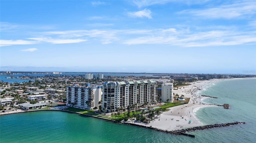 7150 Sunset Way, Unit 903E St. Pete Beach, FL 33706 - Photo 26 of 26 an aerial view of a house with a yard