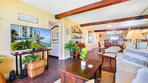 a view of a living room and dining room