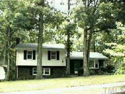 3400 Brentwood Road Raleigh, NC 27604 - Photo 1 of 1 a front view of a house with a yard