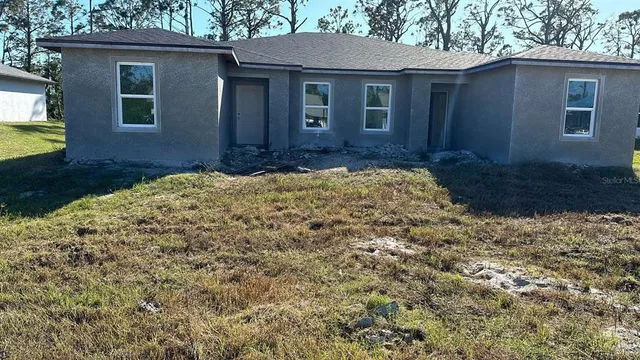 a front view of house with yard