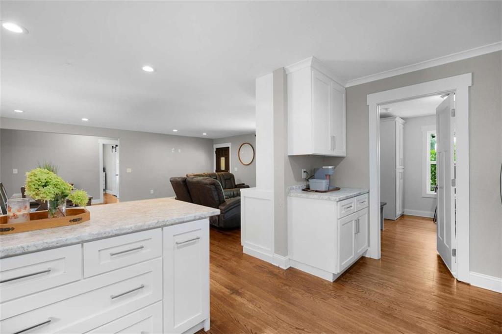 191 Hightower Loop Road Ranger, GA 30734 - Photo 16 of 27 a kitchen with white cabinets and a sink