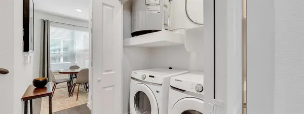 a bathroom with a double vanity sink and mirror