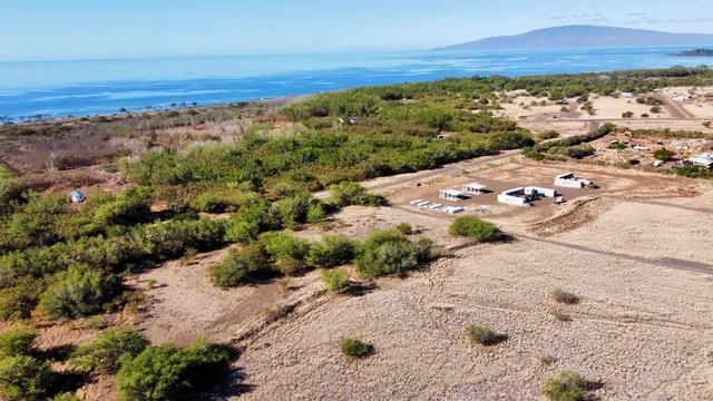 a view of a city with mountains in the background