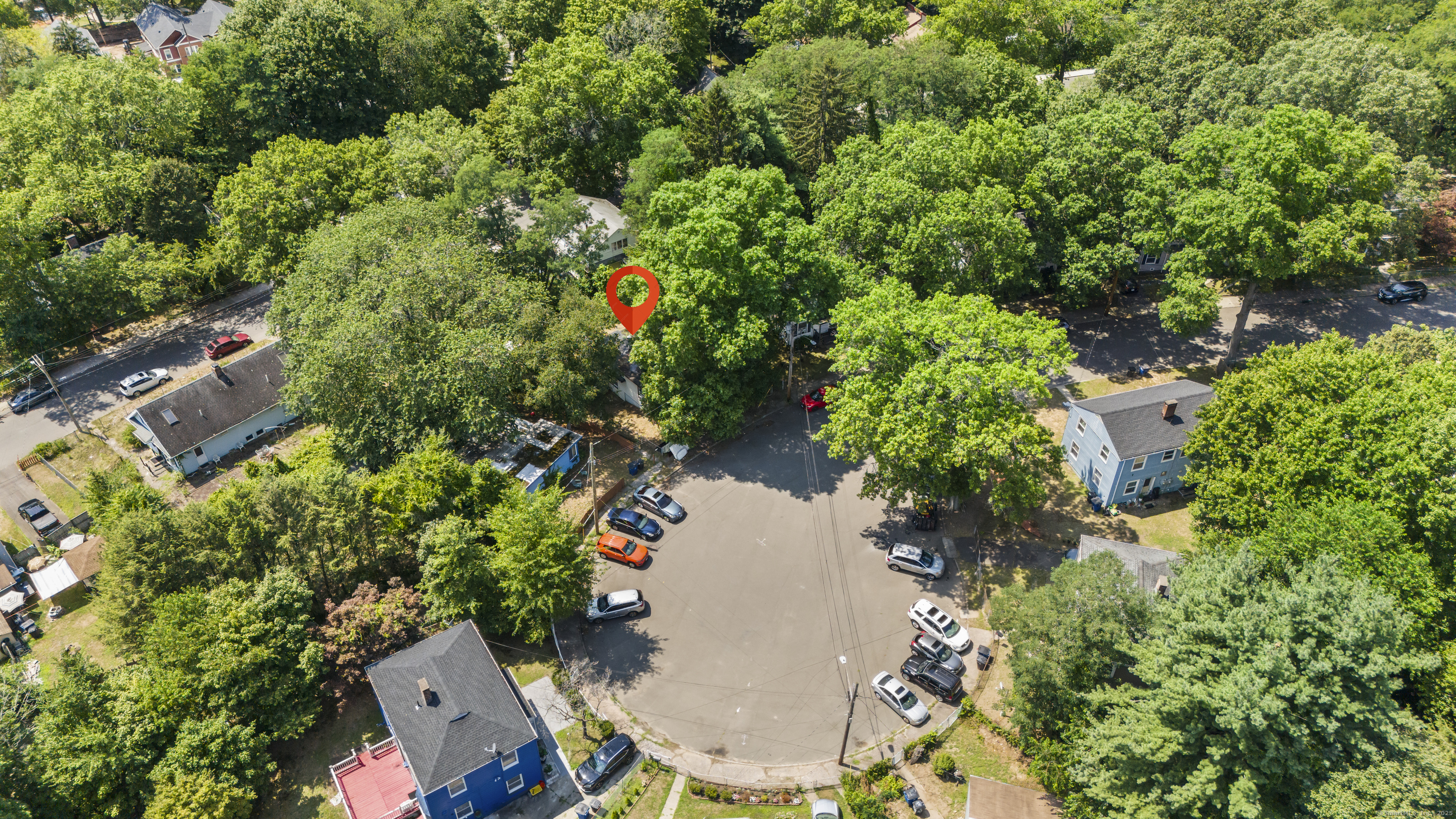 18 Hilltop Road New Haven, CT 06515 - Photo 11 of 13 an aerial view of a house with a yard and trees