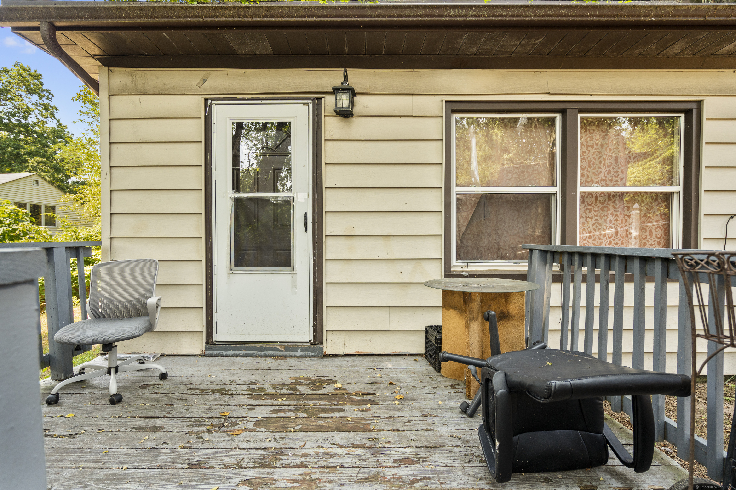 18 Hilltop Road New Haven, CT 06515 - Photo 2 of 13 a front view of a house with outdoor seating