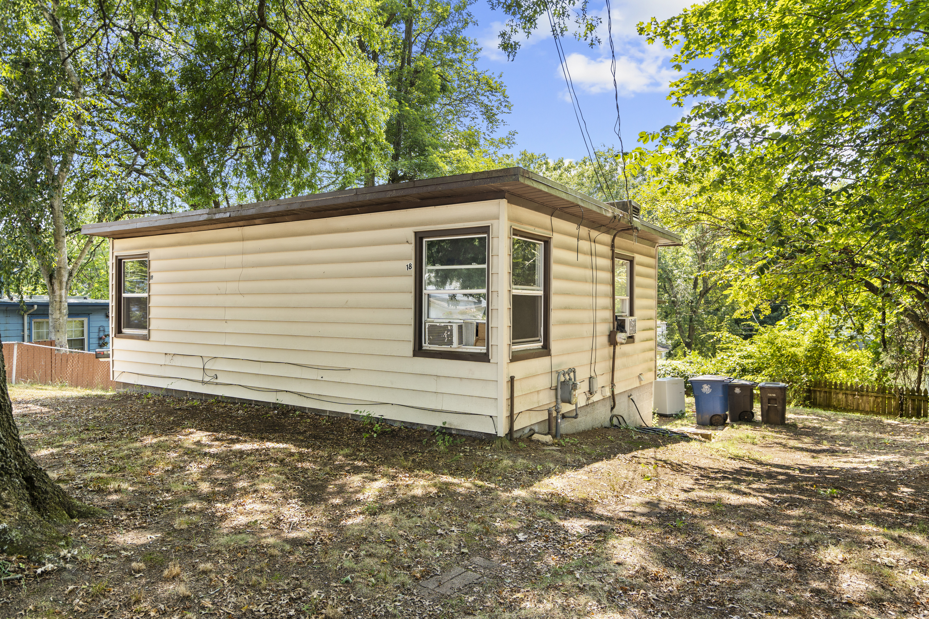 18 Hilltop Road New Haven, CT 06515 - Photo 6 of 13 a view of a house with a yard