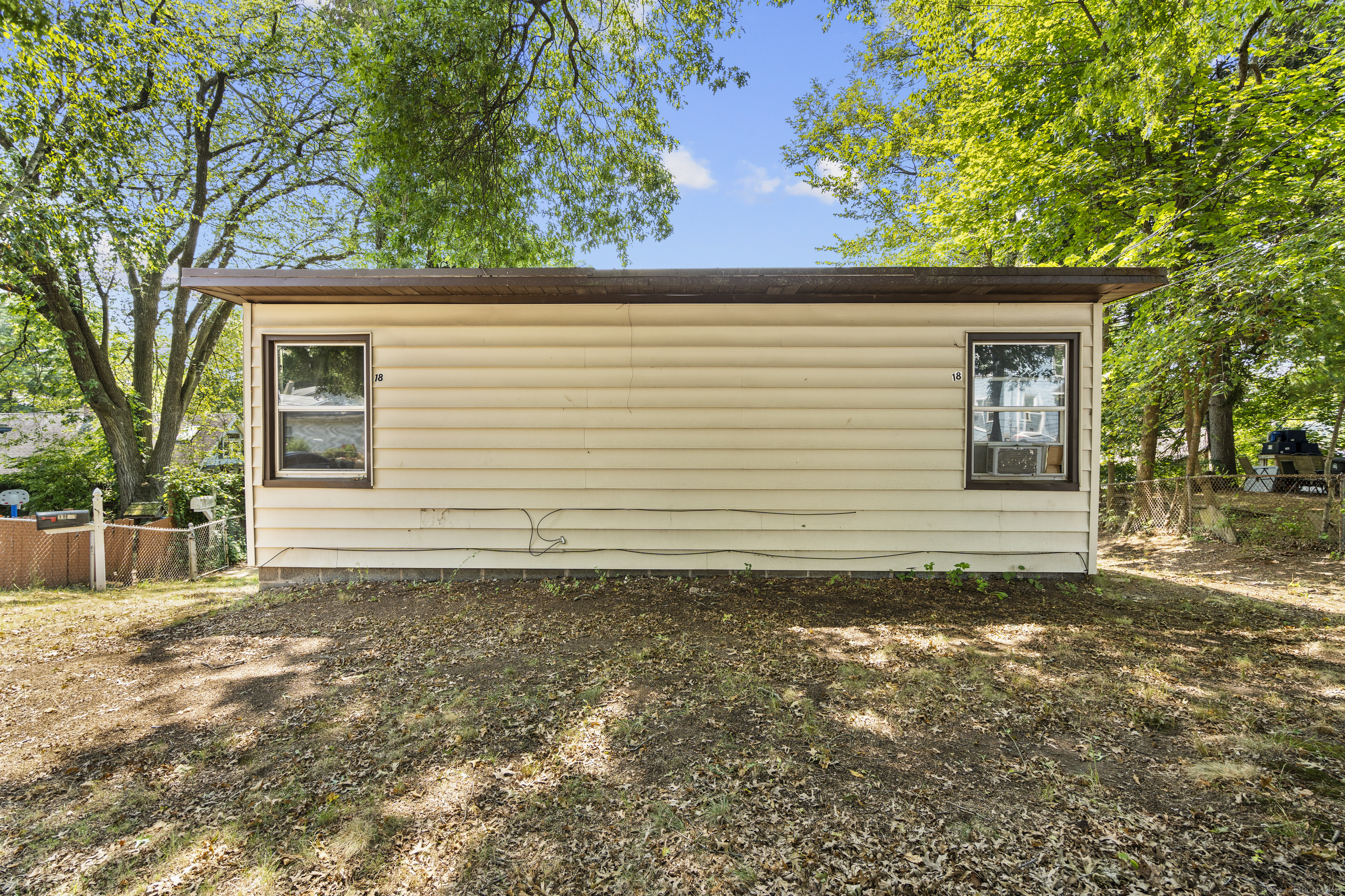 18 Hilltop Road New Haven, CT 06515 - Photo 8 of 13 a view of a house with a yard