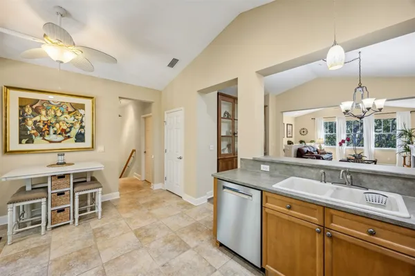 a spacious bathroom with a sink a mirror and a bathtub