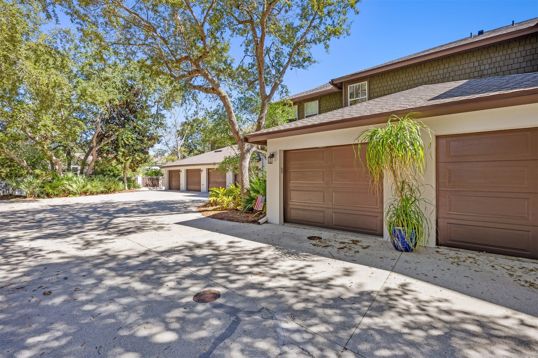 1839 Perimeter Park Road West, Unit 210 Fernandina Beach, FL 32034 - Photo 26 of 37 garage with extra parking area